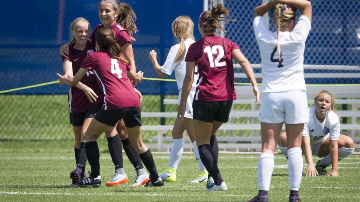 Lee’s Summit North took to some celebrating after a goal by LS North’s Kaylie Rock (with right arm around teammate Madelyn Robinson) on Friday against Lee’s Summit West on Friday in LS North’s 2-0 victory in a Missouri Class 4 semifinal on Friday at Swope Soccer Village.