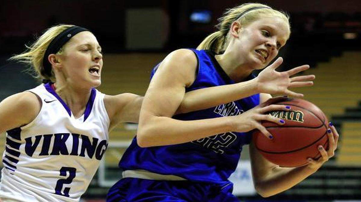 
Liberty’s Morgan Fleming (right) finished with a game-high 20 points and helped the Blue Jays beat Parkway North 55-54 on Friday at Mizzou Arena.
