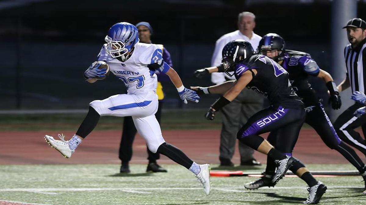 
Liberty High School running back Robert Rawie ran for a touchdown on Friday night in the Blue Jays’ victory over Park Hill South. 
