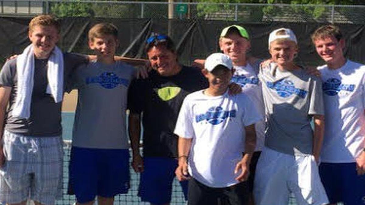 
Members of the Olathe Northwest High School boys tennis team celebrated their Sunflower League team title.
