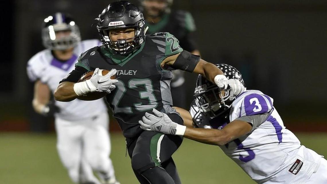 Staley High School’s Julian Ross broke free from Park Hill South’s Jake Springer during a game in November.