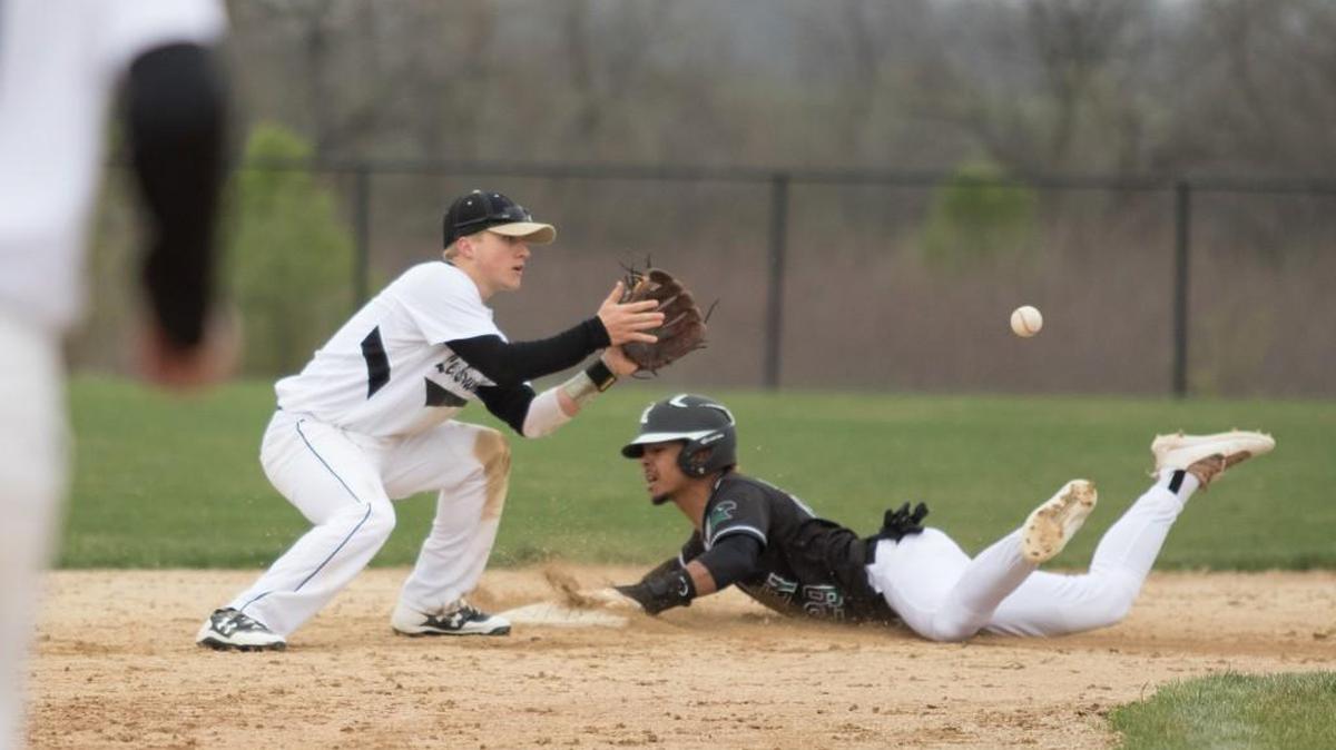 Staley center fielder Rod Criss beats the throw to Lee’s Summit shortstop Austin Polina at second base. Criss is one of two returning starters from last year’s Class 5 state quarterfinalists.