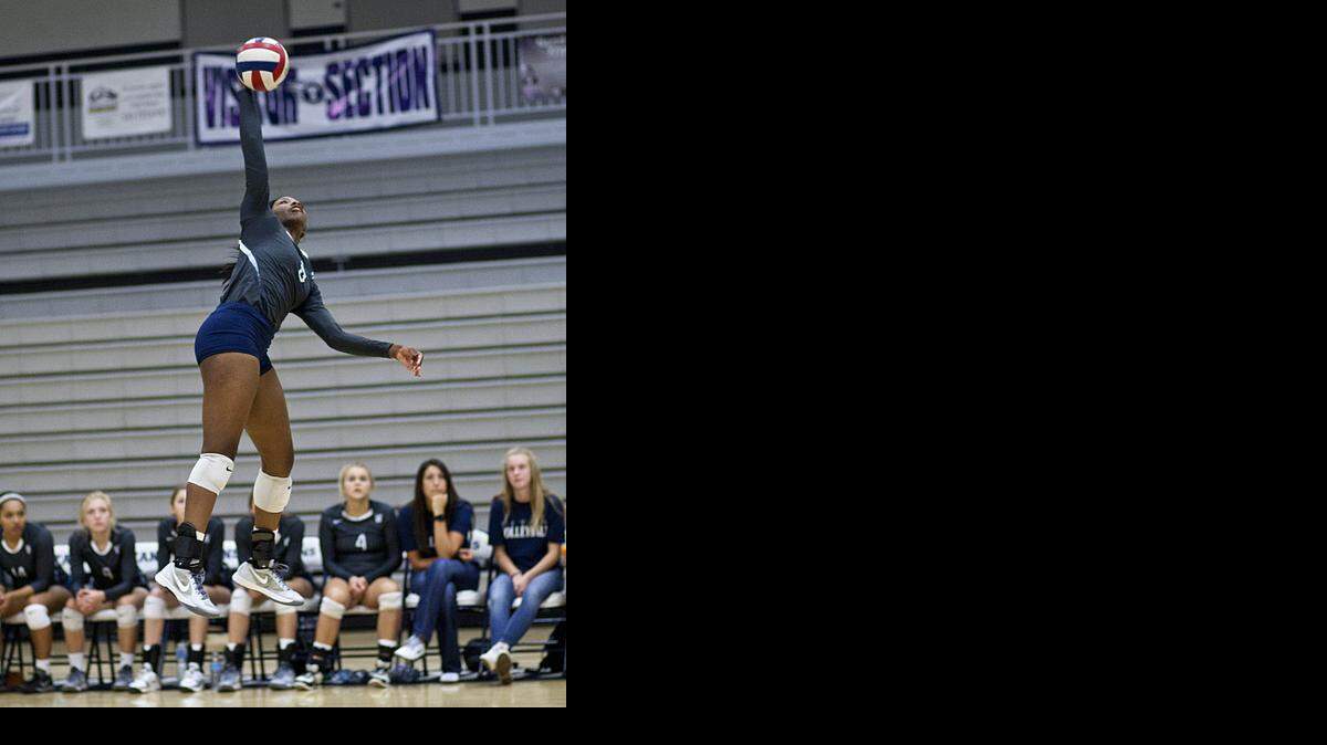 
Carlisa May of Lee’s Summit West connects on a spike earlier this season against Platte County.
