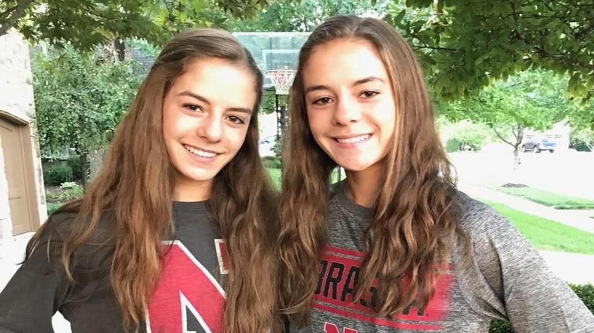 Chloe and Ellie Kuckelman are identical twins from Blue Valley North High School who will take their similarly smashing tennis skills to Nebraska after graduation.
