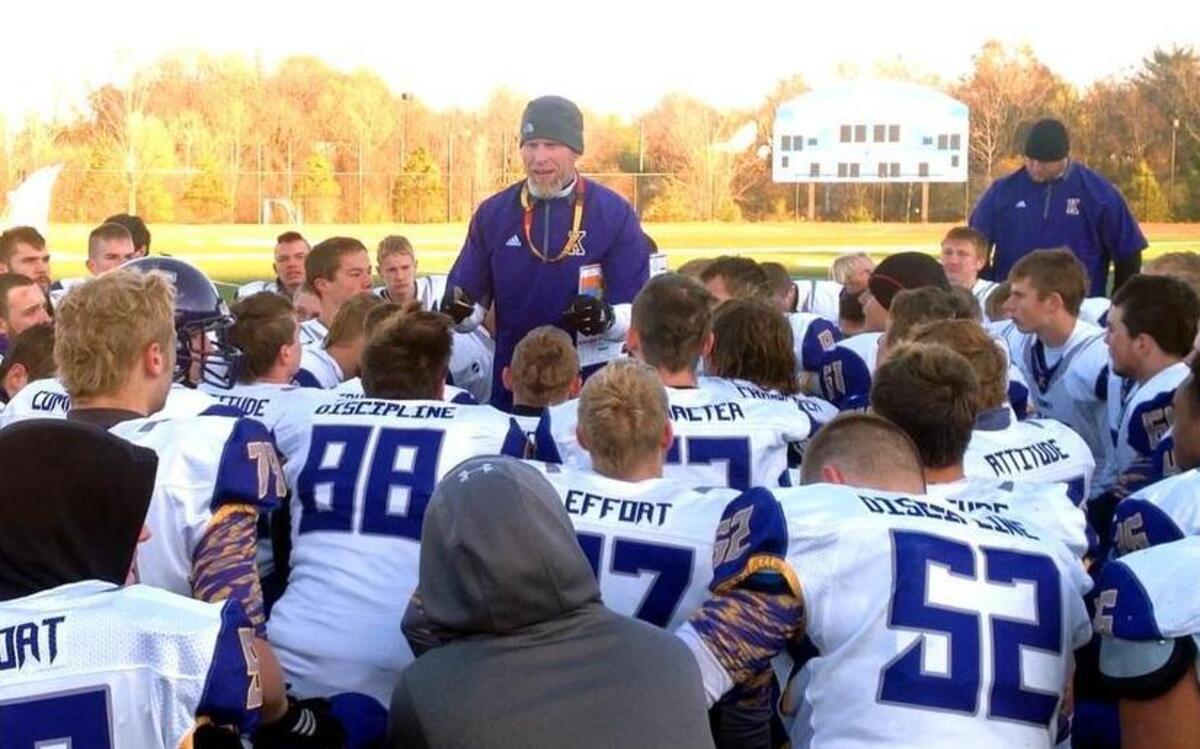 Kearney High School football coach Greg Jones, seen here after a Bulldogs’ playoff victory last season, will build off the momentum of last year’s state title win over Webb City.