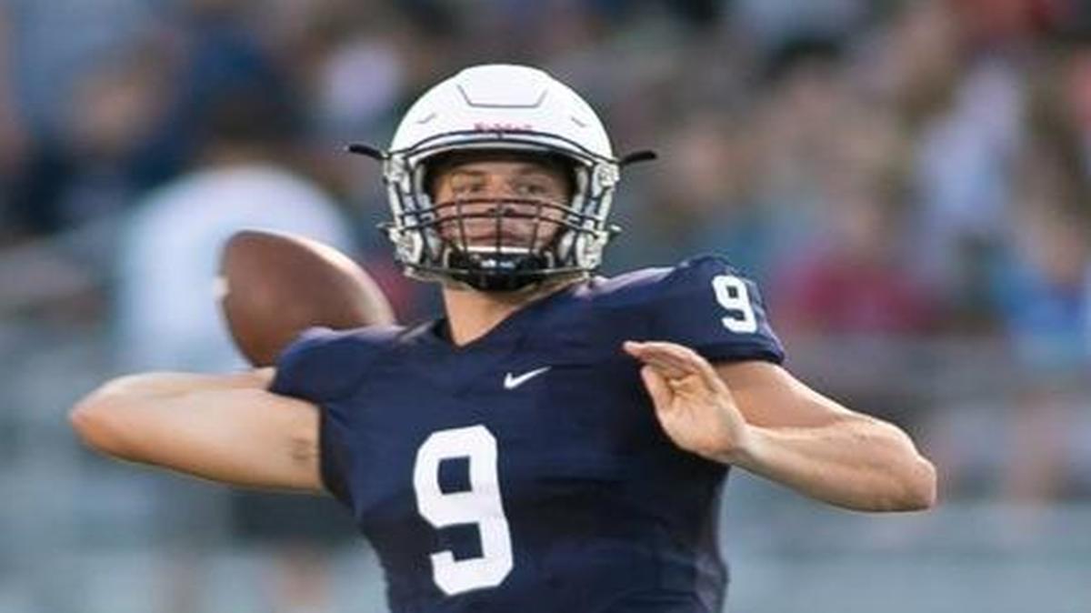 Mill Valley quarterback Brody Flaming dropped back for one of his five touchdown passes.