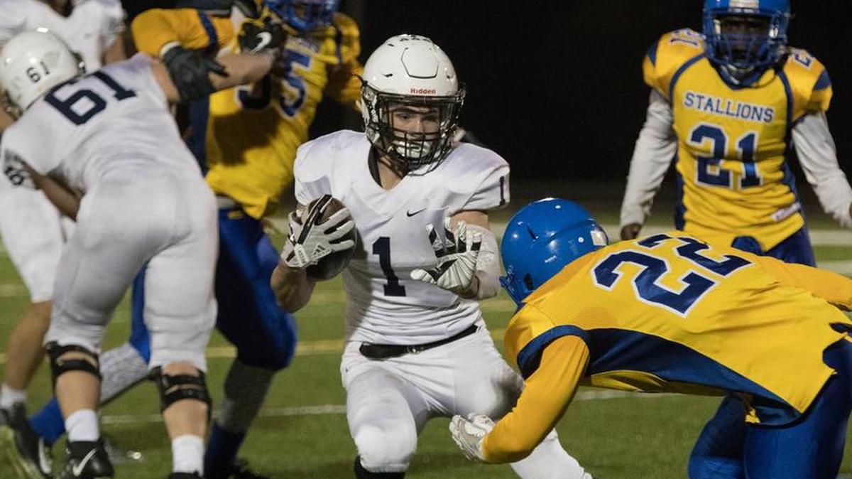 Mill Valley’s Cameron Young ran for four touchdowns against Schlagle on Friday night in a Kansas Class 5A playoff game.