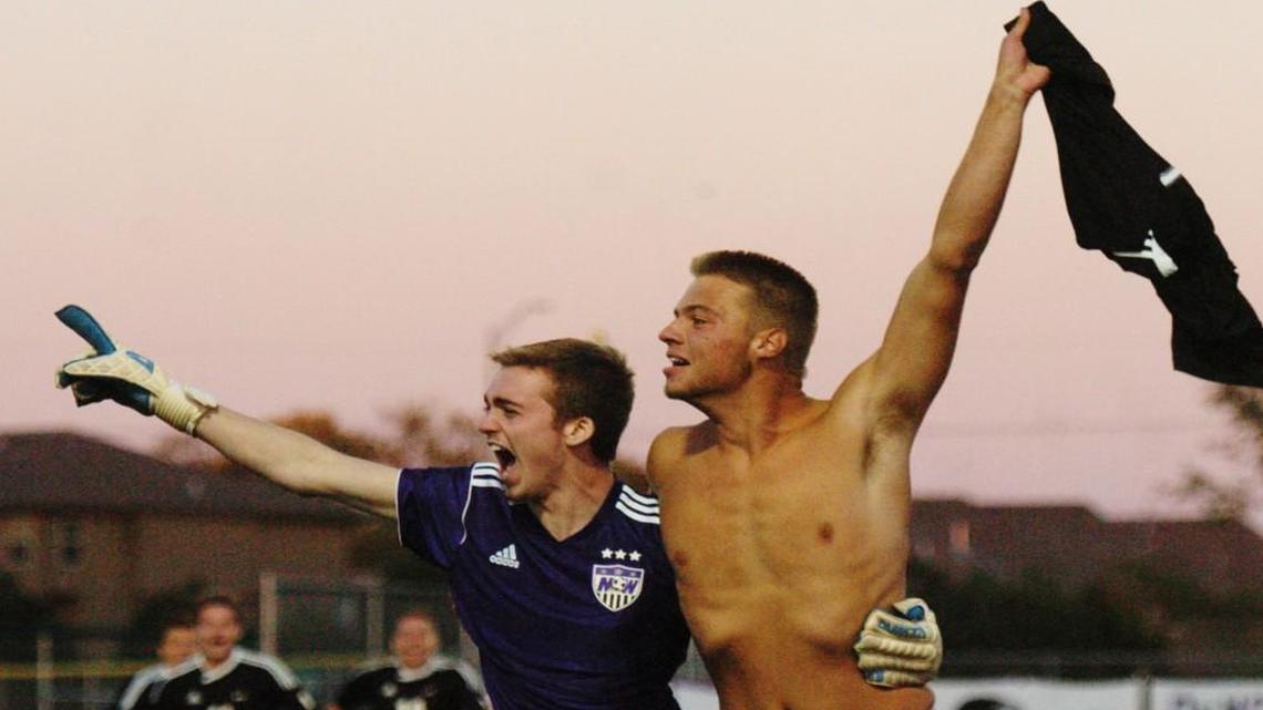 Blue Valley Northwest’s Connor Mathes (left) and Jordan Stenberg celebrated their victory over Topeka Washburn Rural on Saturday.