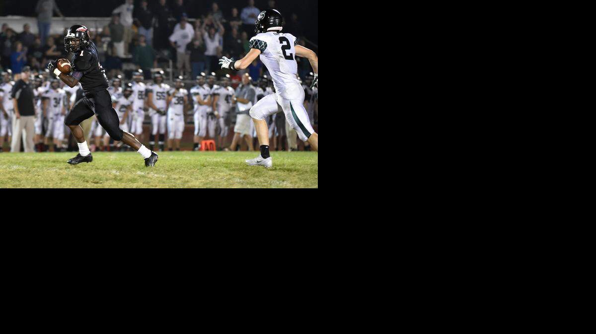 
Fort Osage senior Willie Penamon (left) was well ahead of the Staley defense on way to what turned out to be the winning touchdown against the Falcons on Friday night. Fort Osage has topped three state-ranked opponents in the season’s first five weeks.
