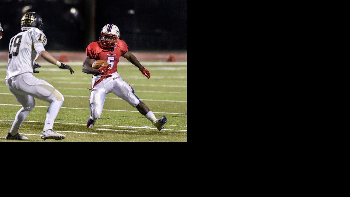 
Olathe North’s Venus Triplett (right) was selected to the All-Sunflower League first team as a running back and punt returner.
