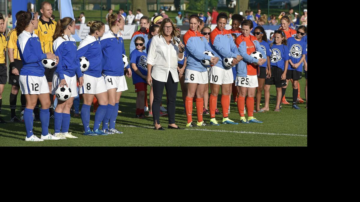 
Players from FC Kansas City (left) and the Houston Dash who were members of the Women’s World Cup championship team from the United States were honored prior to Monday night’s match at Swope Soccer Village. FC Kansas City and Houston battled to a 1-1 tie.

