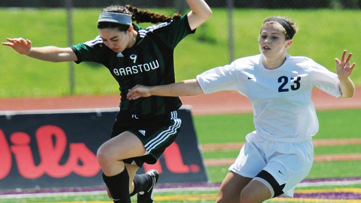 
Barstow’s Lauren Fox (left) attempts to leap back into position on offense despite the efforts of Saxony Lutheran defender Tess Daniel during their match on Friday in a Missouri Class 1 state semifinal match at Blue Springs High School. Saxony Lutheran won the match, 3-0.
