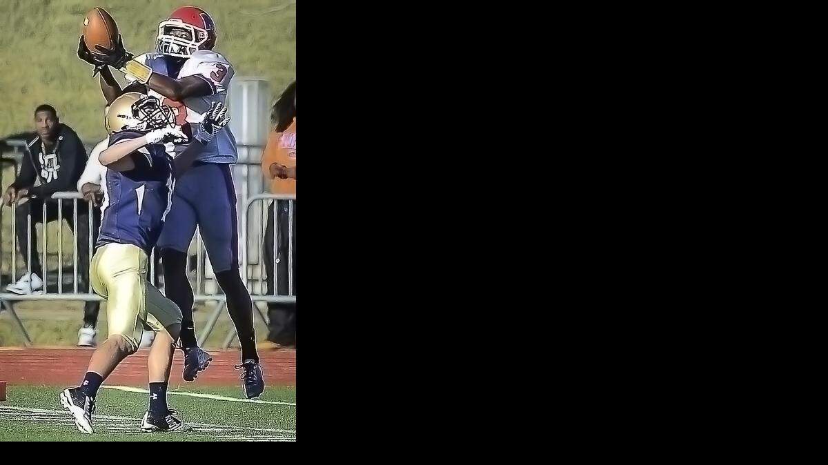
Jafar Armstrong of Bishiop Miege made an acrobatic catch against Topeka Hayden during the Kansas Class 4A Division I state title game on Saturday. Armstrong finished the game with two touchdowns.
