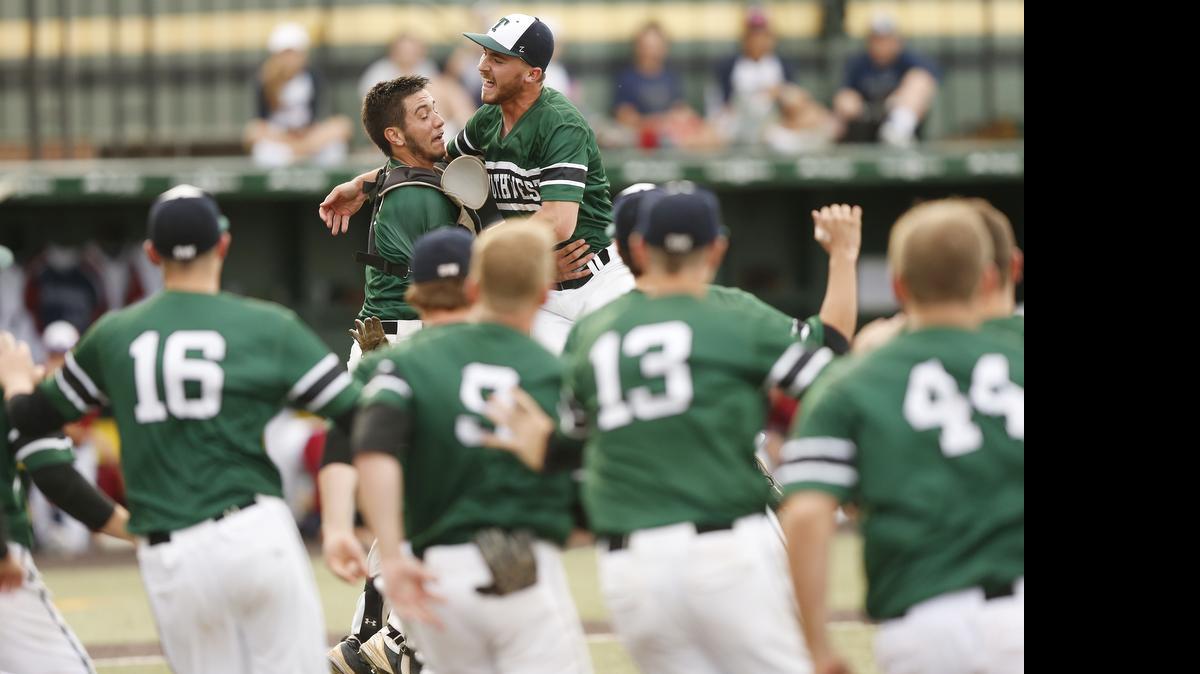 
Blue Valley Southwest pitcher Miller Hogan leaped into the arms of catcher Andrew Gillett after Hogan struck out the final Topeka Seaman batter last week in the Kansas Class 5A baseball state tournament championship game in Wichita.
