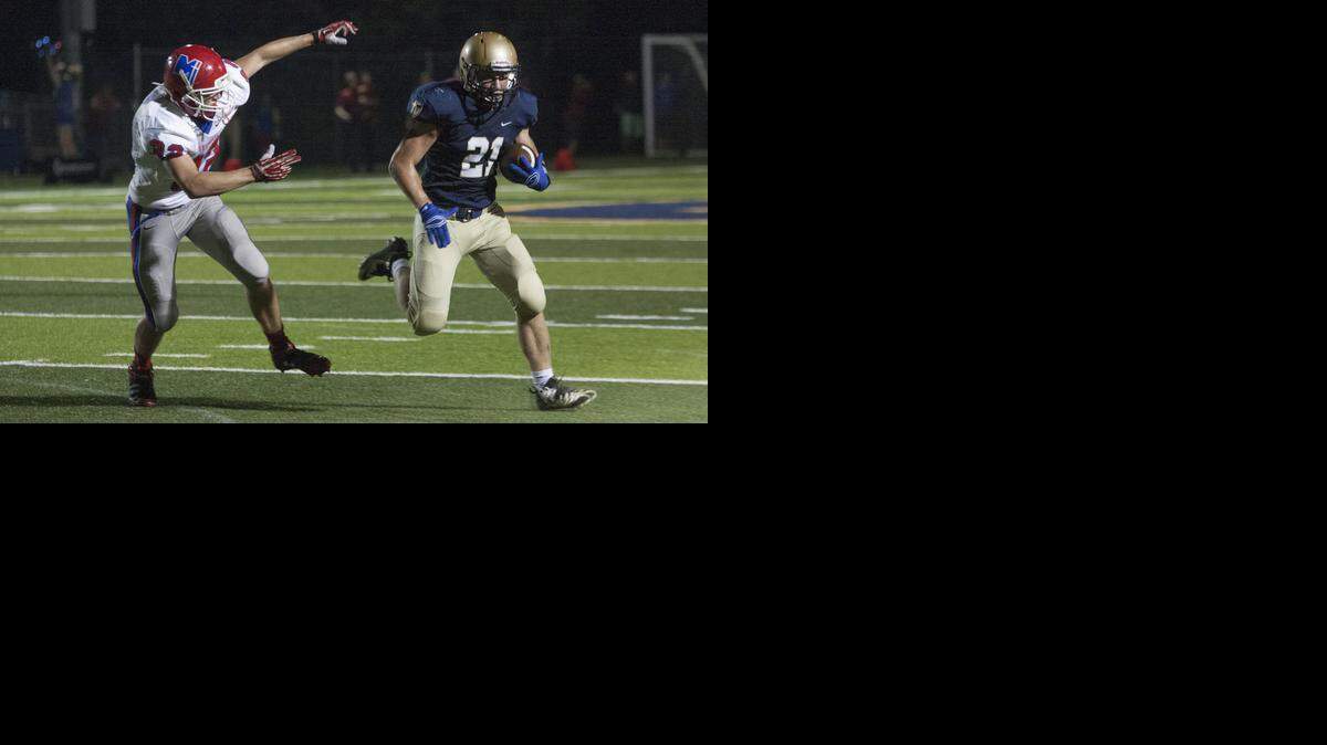 
Jacob Leikam (right) of St. Thomas Aquinas eluded defender Zack MacDonald of Bishop Miege during their game Friday night at Aquinas.
