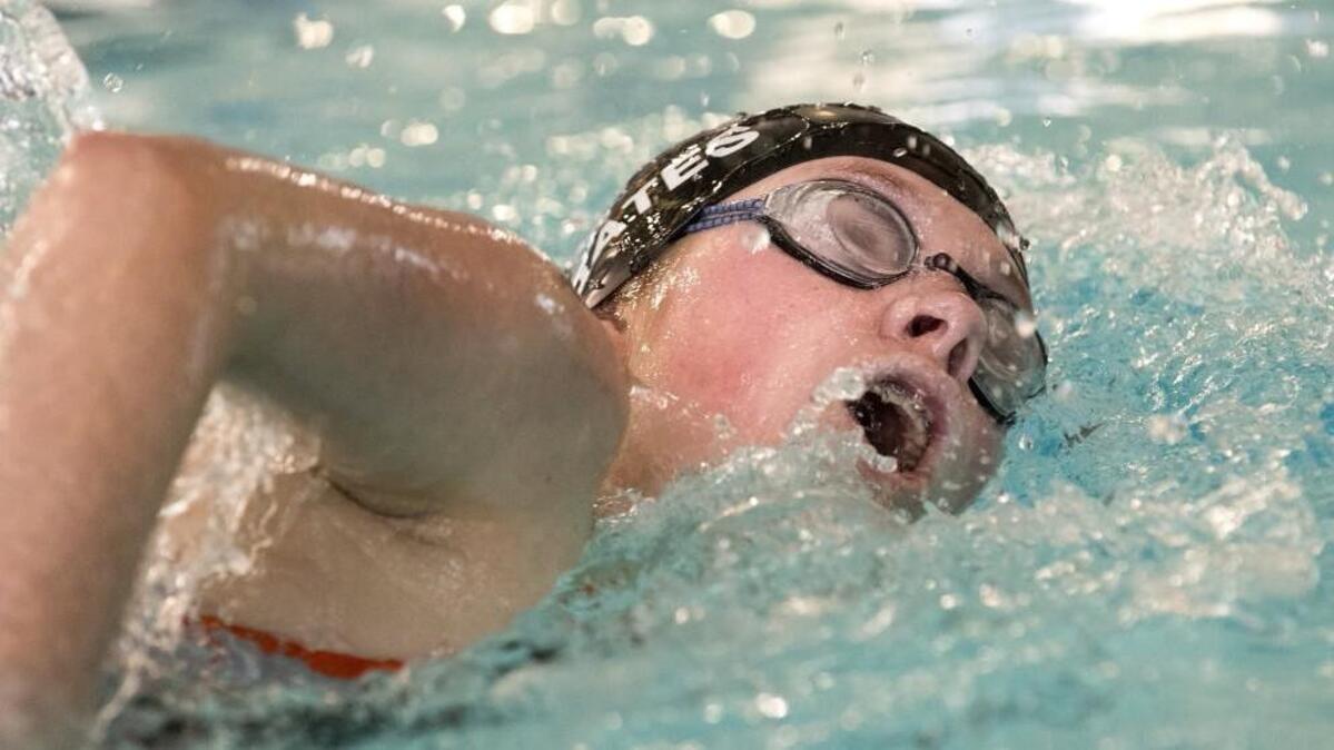Squirt Zimmerman of Winnetonka, competes in the 500 yard freestyle during the Suburban Blue Conference swim meet Saturday at the Gladstone Community Center. Winnetonka placed fourth in the meet behind team champion Kearney.