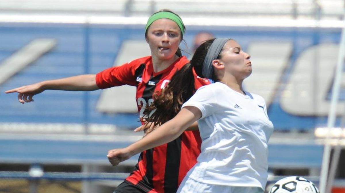 Shawnee Mission West’s Laura Florez (right) and Blue Valley West’s Shelby Christopherson earned first team all-league honors this season after helping their teams make the Kansas 6A state championship game, which was won by SM West 1-0.