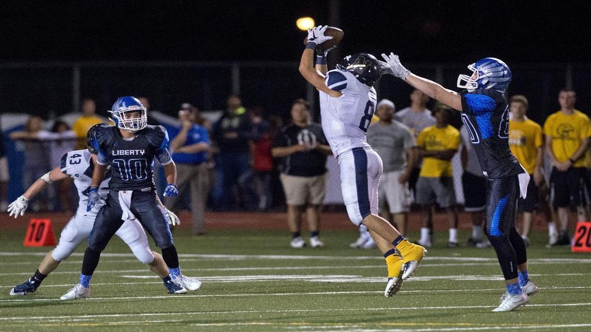 Liberty North’s Brett DeMeyer intercepted three passes in the Eagles’ loss to crosstown rival Liberty on Friday night, and he returned one for a touchdown.