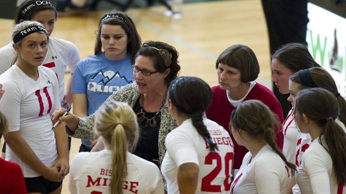 Gwenn Pike, seen here coaching her Bishop Miege High School volleyball team in 2012, retired during the summer after 36 years as the Stags’ coach.