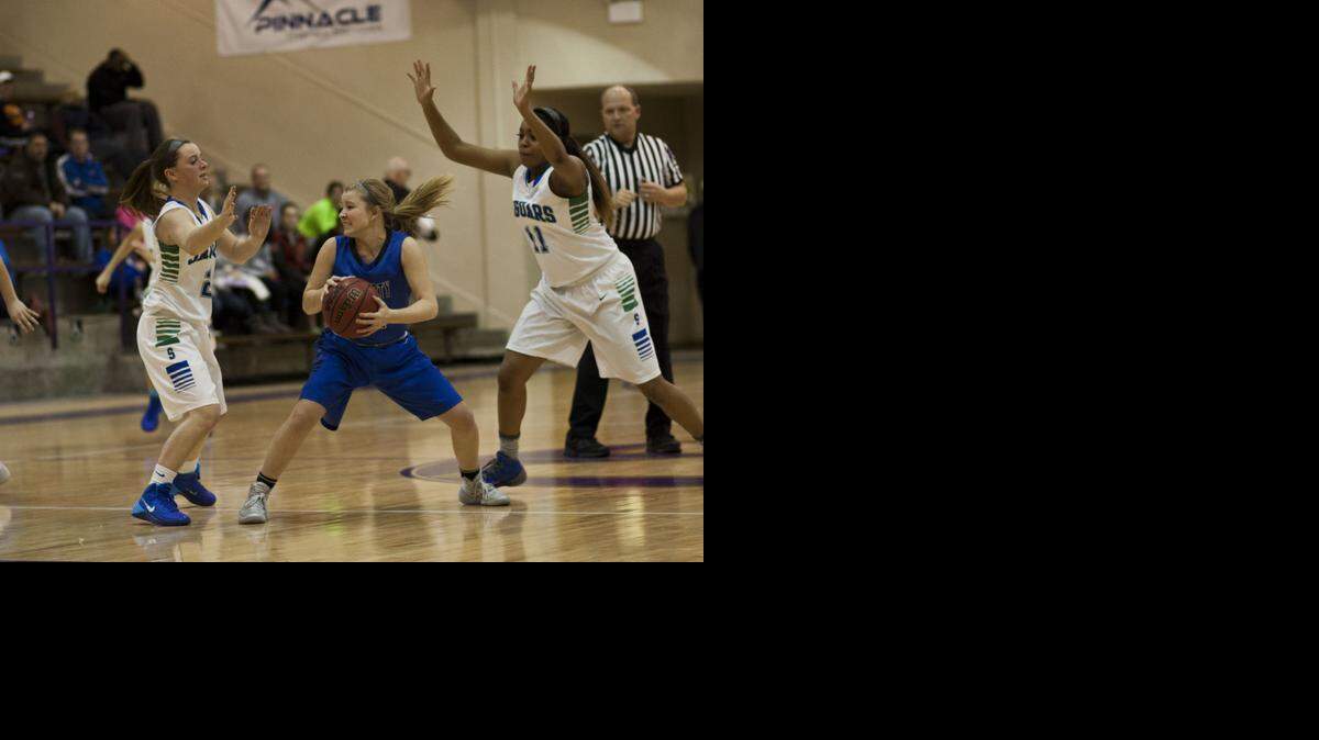 
Blue Springs South’s Cloe’ Lane (right), seen here in a game against Liberty last season, scored 24 points in a victory on Friday against Parkway South.
