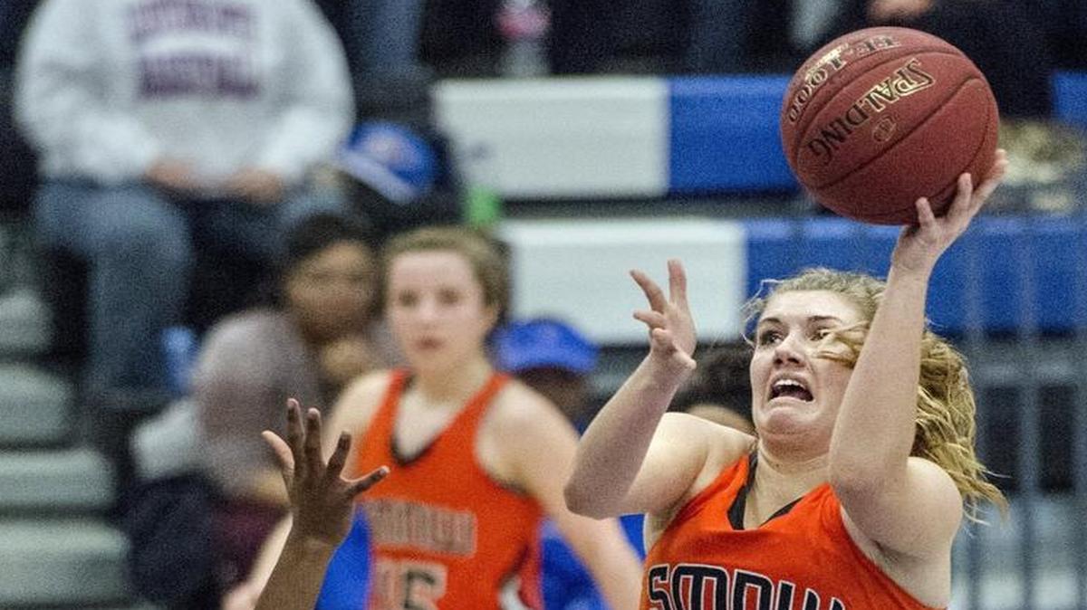 SM Northwest’s Brenni Rose (with ball) made first team All-Sunflower League this season.
