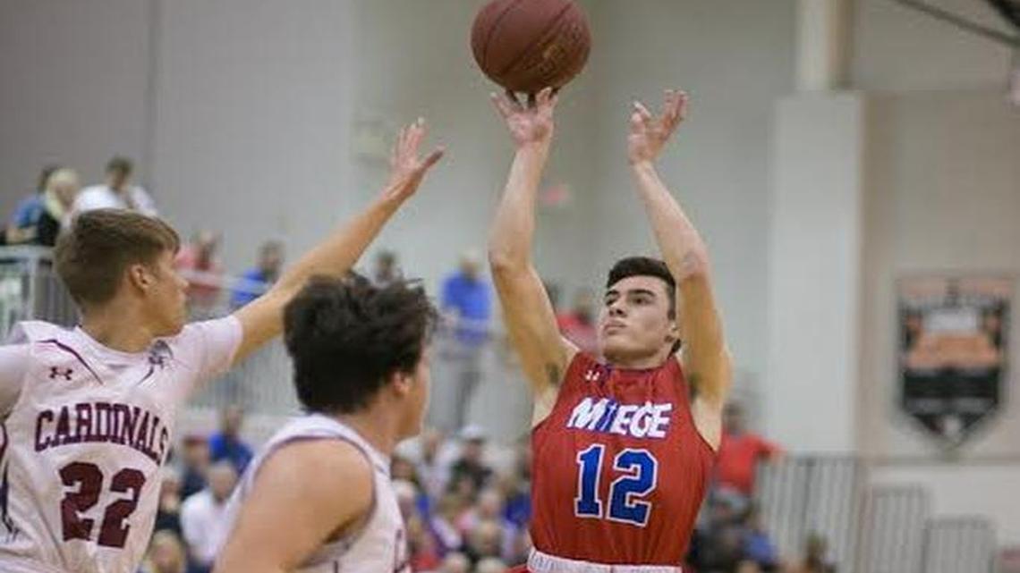 Bishop Miege’s Landry Weber got off a shot against Eudora’s defense in the Stags’ 49-40 win Saturday night in the Bonner Springs substate final.