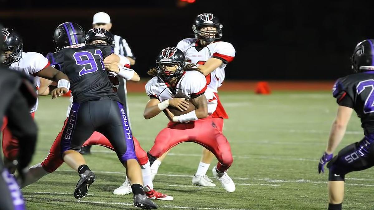 
Park Hill running back Zach Neal looked for running room against Park Hill South during their game on Friday night. Park Hill defeated the Panthers, 29-3.
