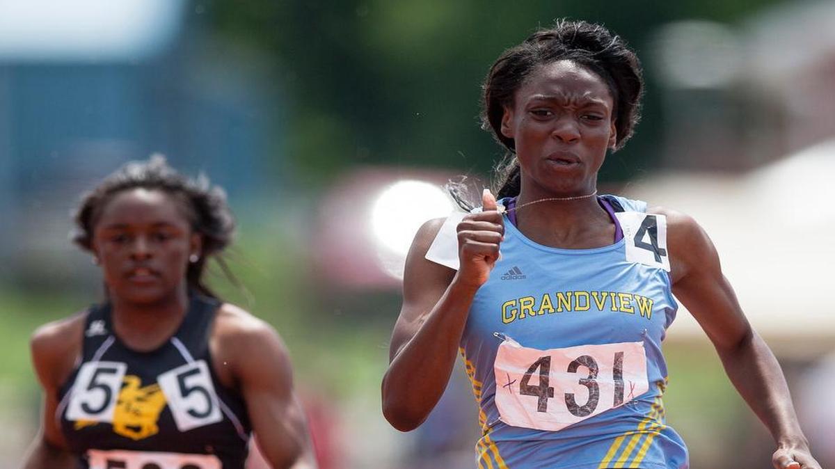 
Grandview’s Anglerne Annelus (right) won the Class 4 girls’ 200 meters Saturday at the Missouri state track meet in Jefferson City. 

