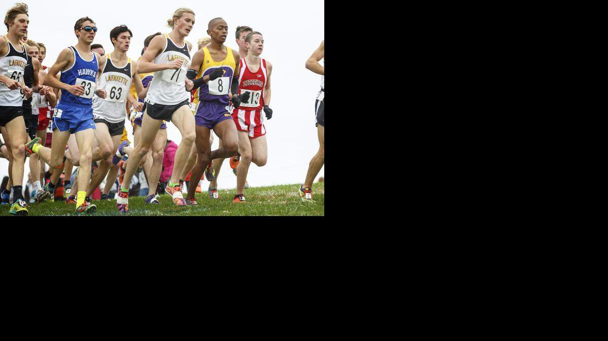 
Stephen Mugeche (No. 8) of Blue Springs High School finished first in the Class 4 boys race on Saturday at the MSHSAA Cross Country State Championships in Jefferson City.
