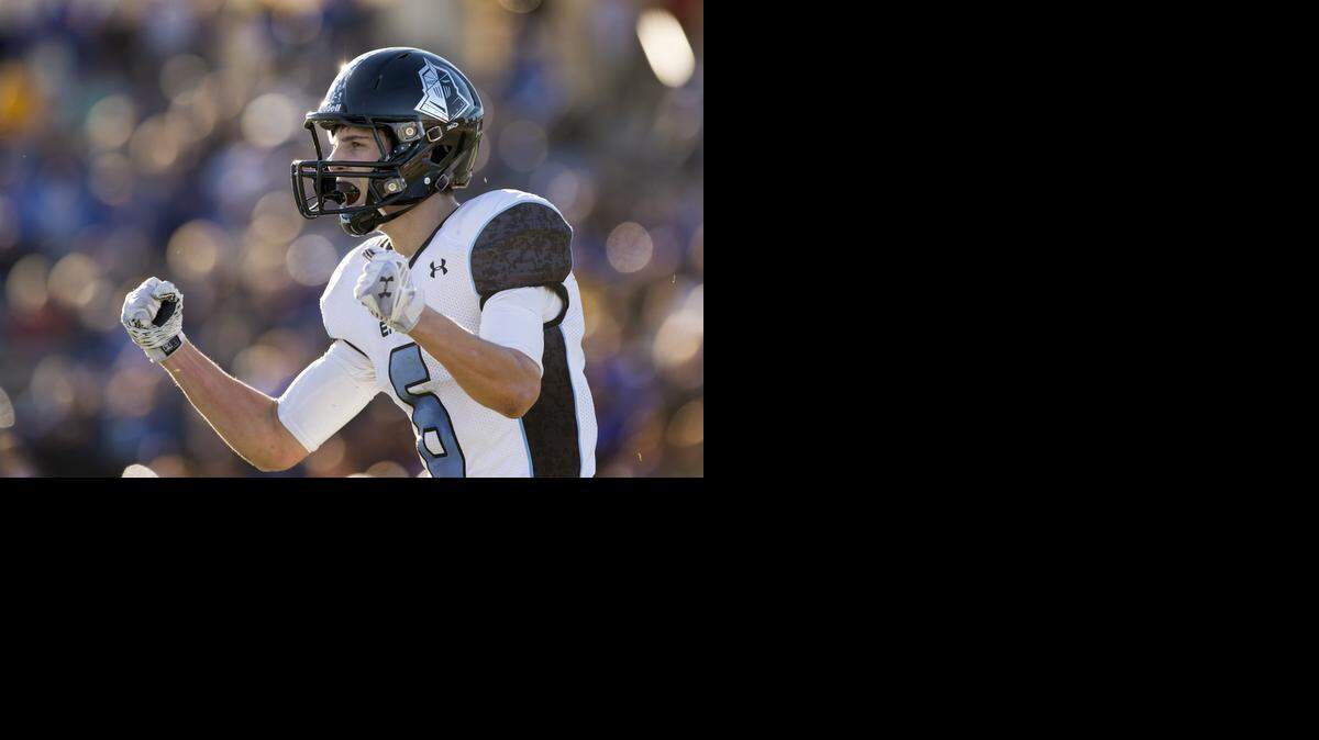 Shawnee Mission East senior wide receiver Charley White celebrated a touchdown catch in the fourth quarter of the Kansas Class 6A state football championship game on Saturday in Emporia. The Lancers went on to win 33-14.