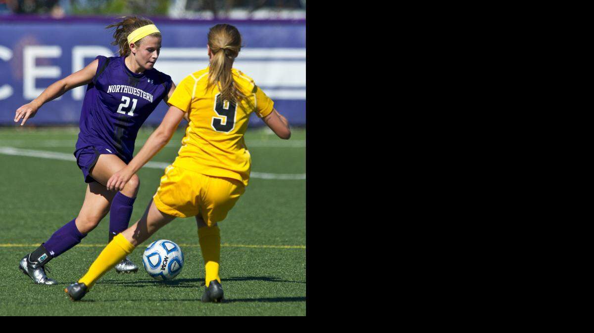 
Northwestern University women's soccer player Addie Steiner (left) controlled the ball in a match against Iowa last season in Evanston, Ill.
