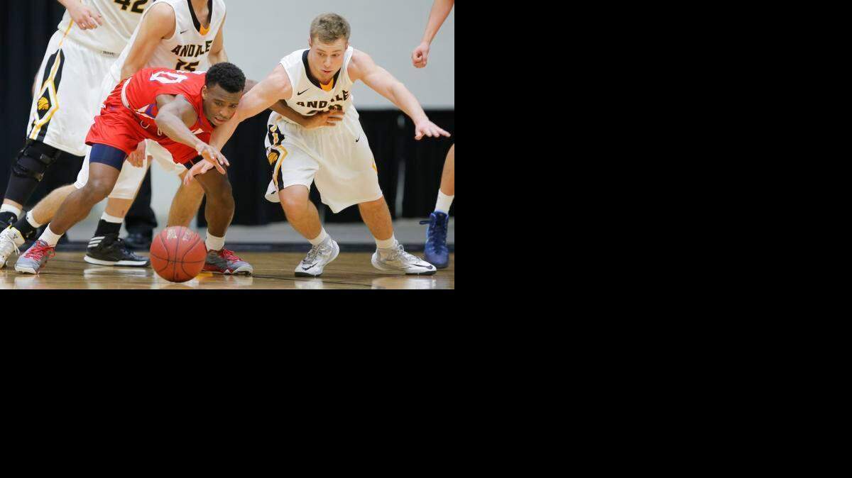 
Andale’s Hunter Knoblauch (right) fights for a loose ball against Alston Jones of Bishop Miege during their Kansas Class 4A Division I quarterfinal game on Wednesday in Salina, Kan.
