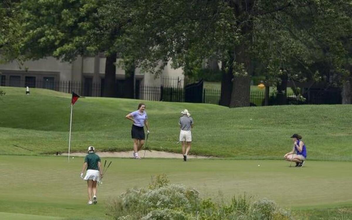 
A foursome putts on the 10th green during Tuesday’s first leg of a three-round Sunflower League girls golf tournament at Deer Creek Golf Course in Overland Park, Kan.
