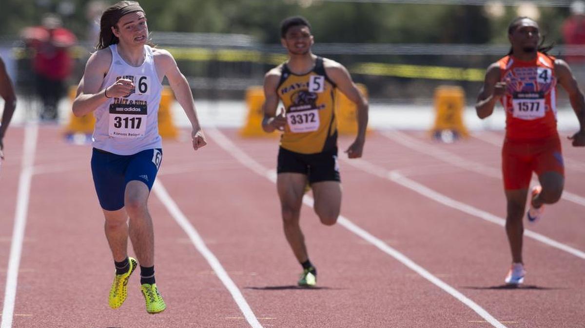 Olathe South High School sprinter Cameron Waldo (second from left) dug hard for the finish line in the 400-meter run on Saturday at the Kansas Relays at Rock Chalk Park in Lawrence, Kan.