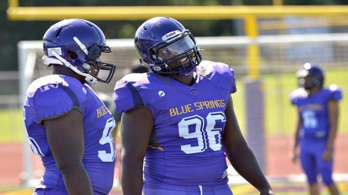 
Twin brothers Khalil (left) and Carlos Davis are defensive tackles at Blue Springs High School.

