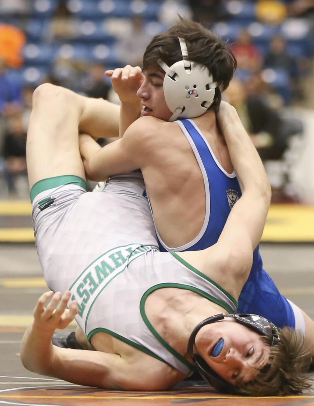 Michael Spangler, a Kapaun Mt. Carmel senior wrestler