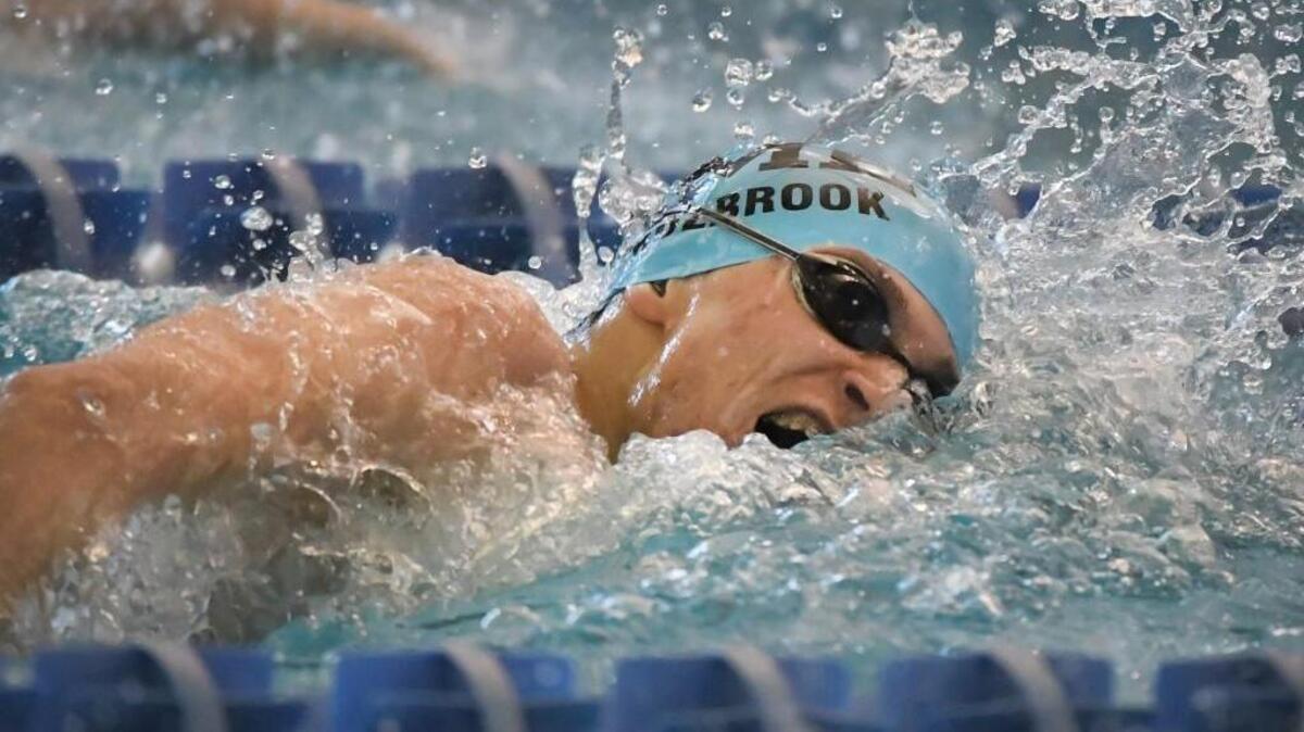 SM East's Aidan Holbrook competed in the 200-yard freestyle at the Kansas Class 6A state meet on Saturday in Topeka. Holbrook finished third for SM East, which won its third straight team title.