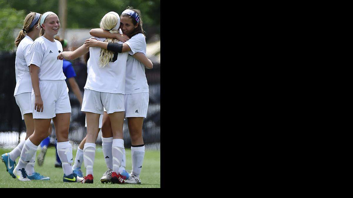 
The Sunflower League’s best team finish at the Kansas Class 6A girls soccer state tournament was third place by Shawnee Mission West, which defeated Washburn Rural 1-0. At the conclusion of the match, some of the Vikings’ players celebrated the victory.
