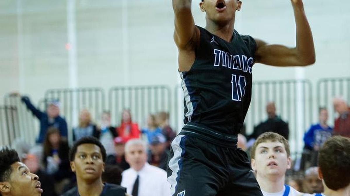 Lee’s Summit West guard Mario Goodrich went up for a basket during the Nelson Division championship game Wednesday.