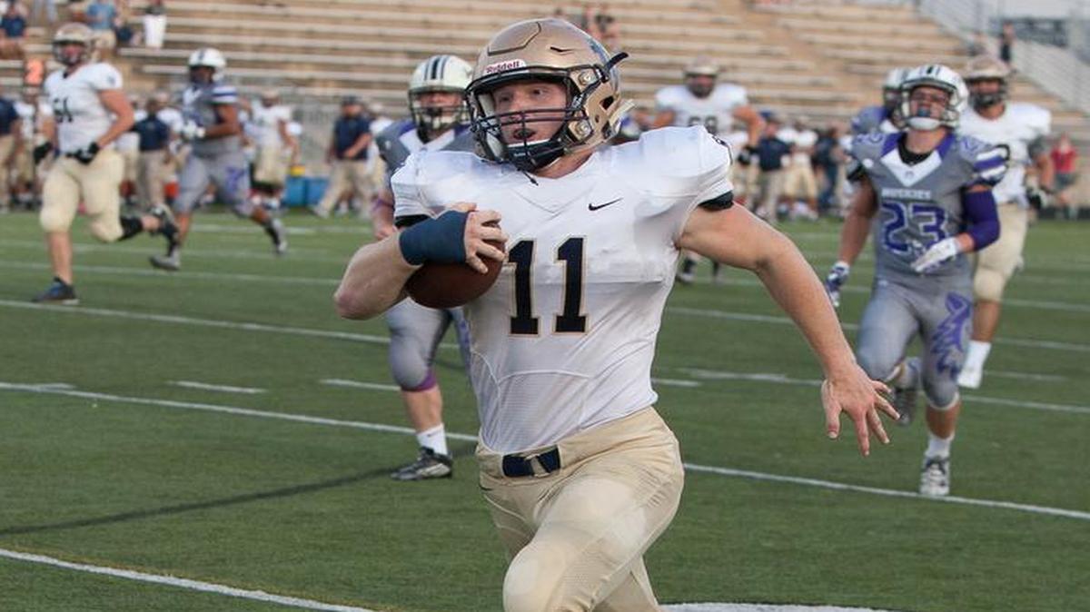 
St. Thomas Aquinas’ Sam Ramaekers’ touchdown run in the first quarter on Thursday night put the Saints up 14-0.
