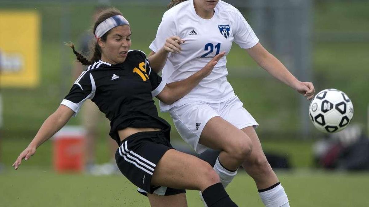 Shawnee Mission West’s Sinclaire Miramontez (left) was the Sunflower League defender of the year.