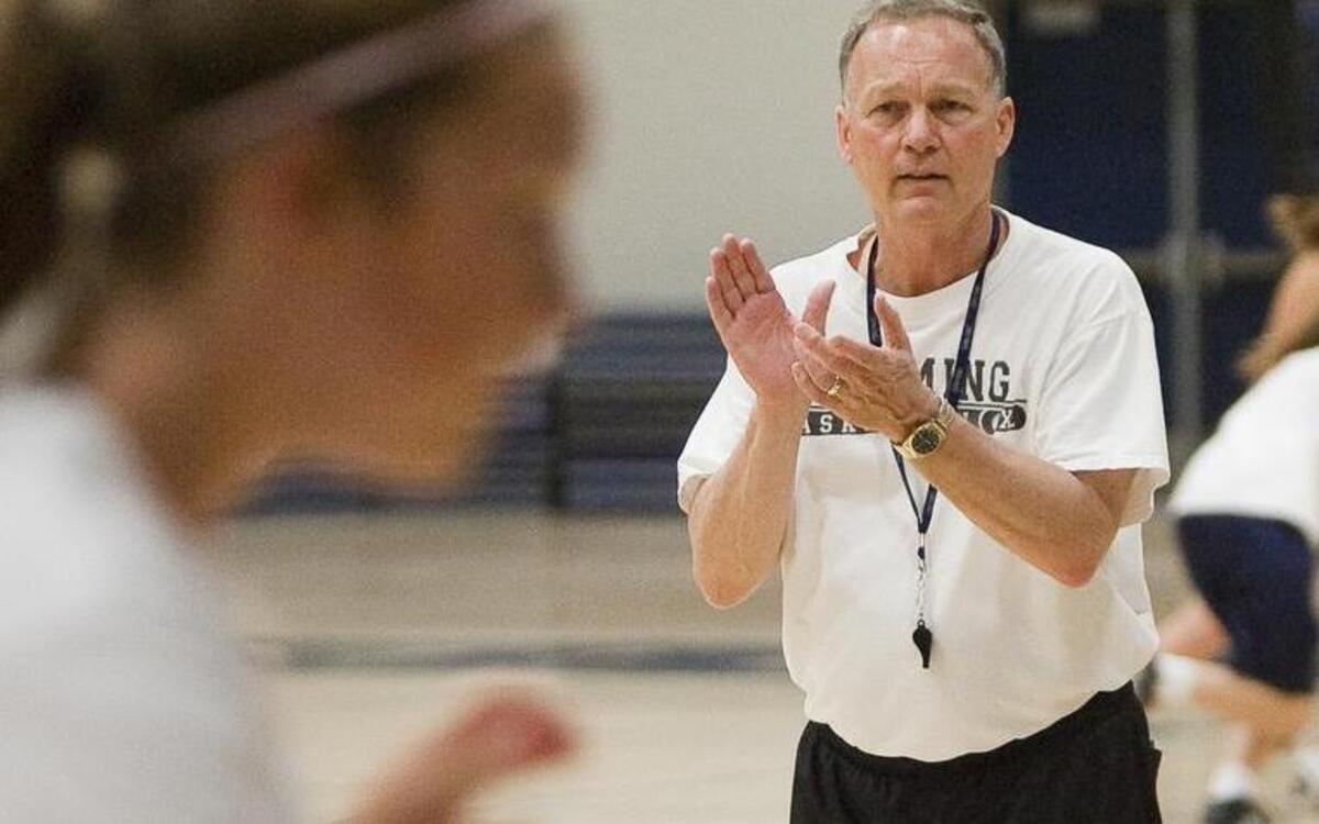 John McFall applauded the effort during a girls basketball camp defensive drill in June, 2010, at Mill Valley High School. McFall, who has coached at four Kansas City-area schools and won 530 games during a 33-year career, has announced his retirement.