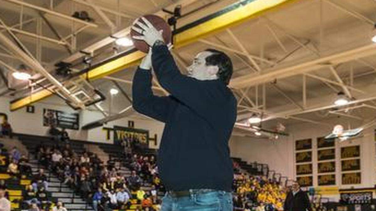 
Greg Gurley tried to duplicate his historical three-point shot during a reunion on Friday night at Shawnee Mission South. At halftime of a game between SM South and SM West on Friday, the Raiders were celebrating the 1990 basketball team’s undefeated season and state championship. In the 1990 championship game, Gurley hit the game-winner with 2 seconds left against Wichita South.


