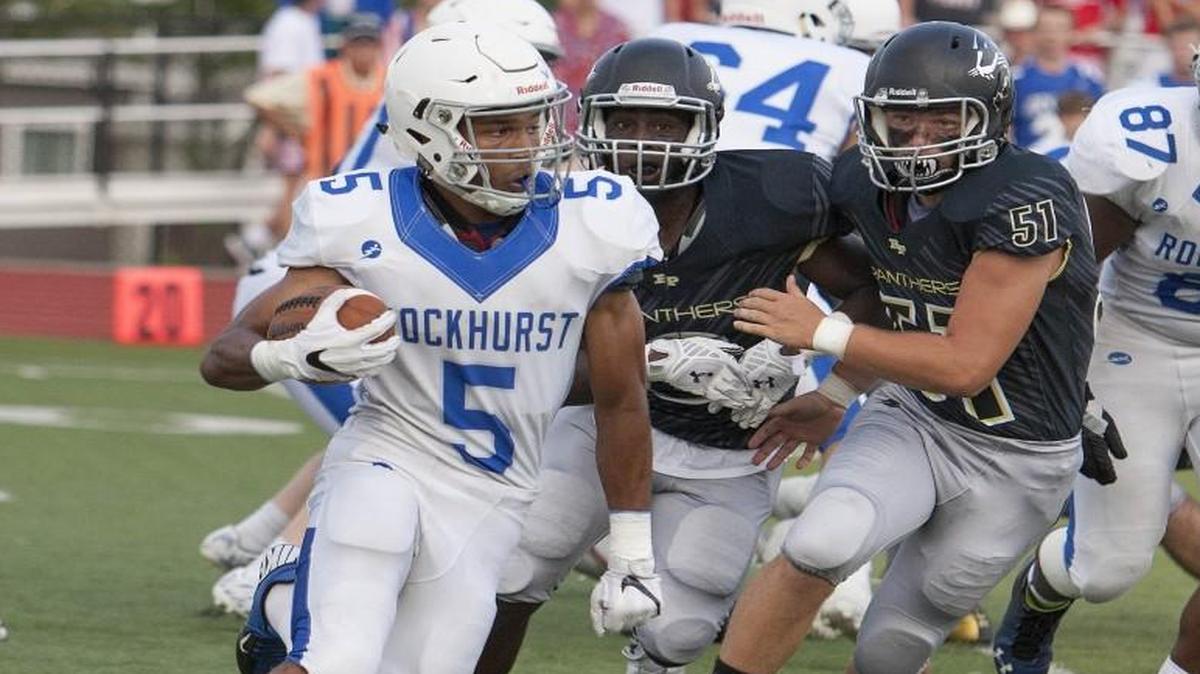 Rockhurst’s Michael Pearl turned the corner to get extra yards at a game against Raymore-Peculiar.