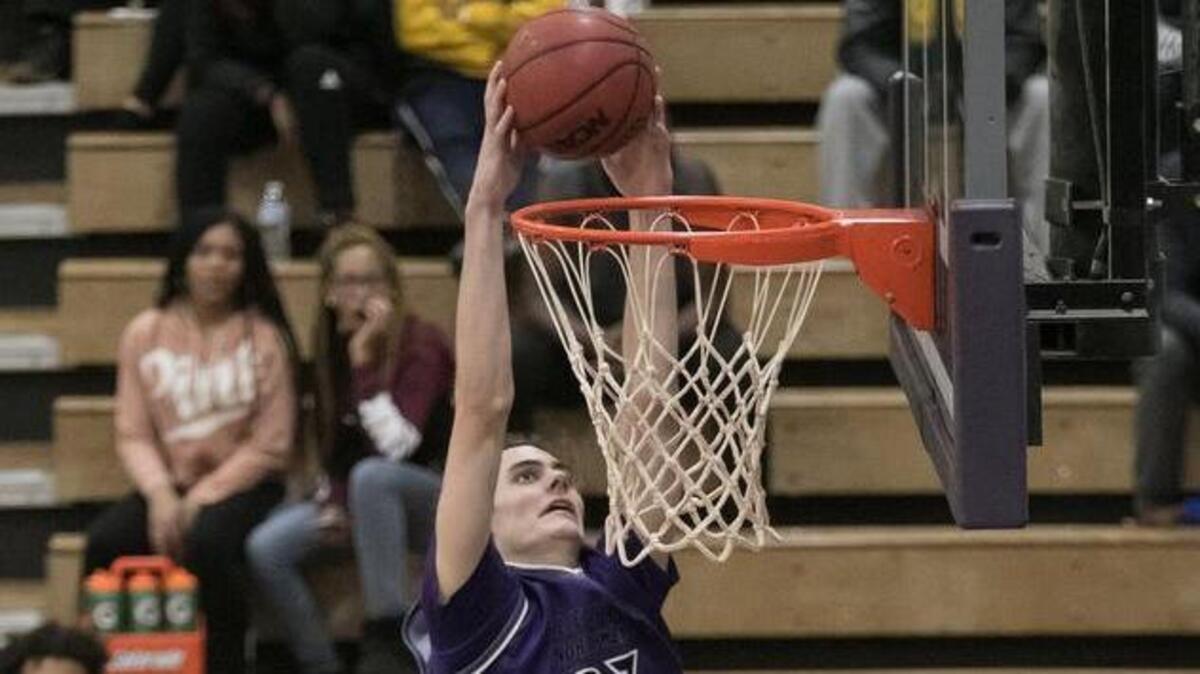 Parker Braun (dunking) and Blue Valley Northwest are set to square off against Grandview in the 810 Varsity Showcase at Lee’s Summit High School on Saturday.