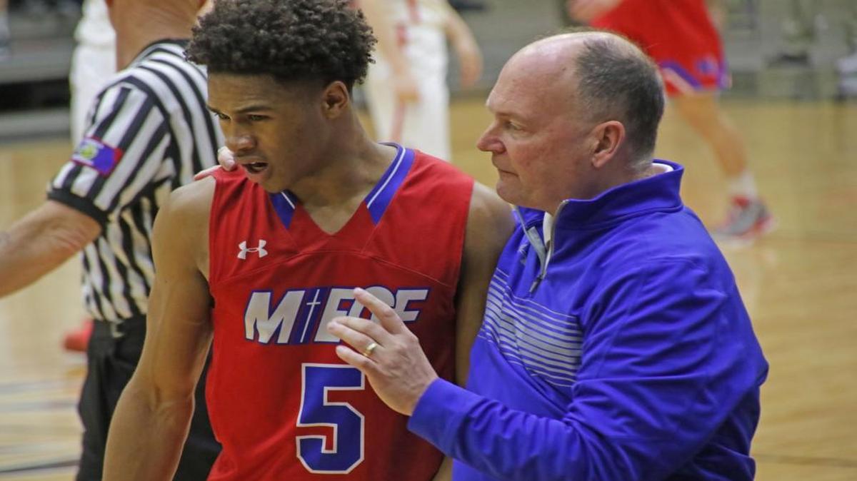Bishop Miege boys basketball coach Rick Zych (right)
