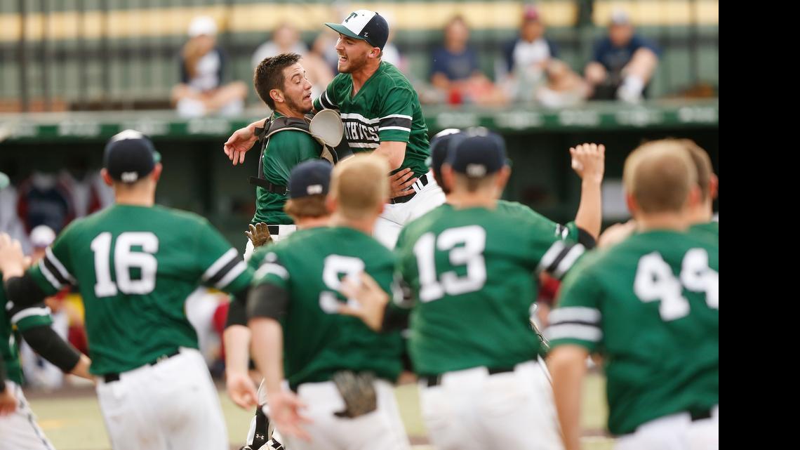 
Blue Valley Southwest pitcher Miller Hogan jumped into the arms of his catcher Andrew Gillett after striking out the side to seal a state title. 
