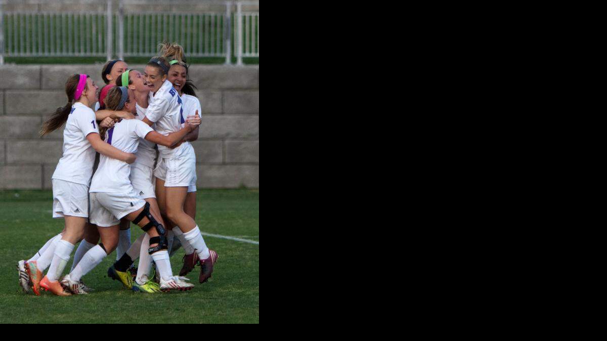 
BV Northwest's Cece Kizer (center) was in the middle of the celebration after scoring the winning goal on Tuesday.

 

