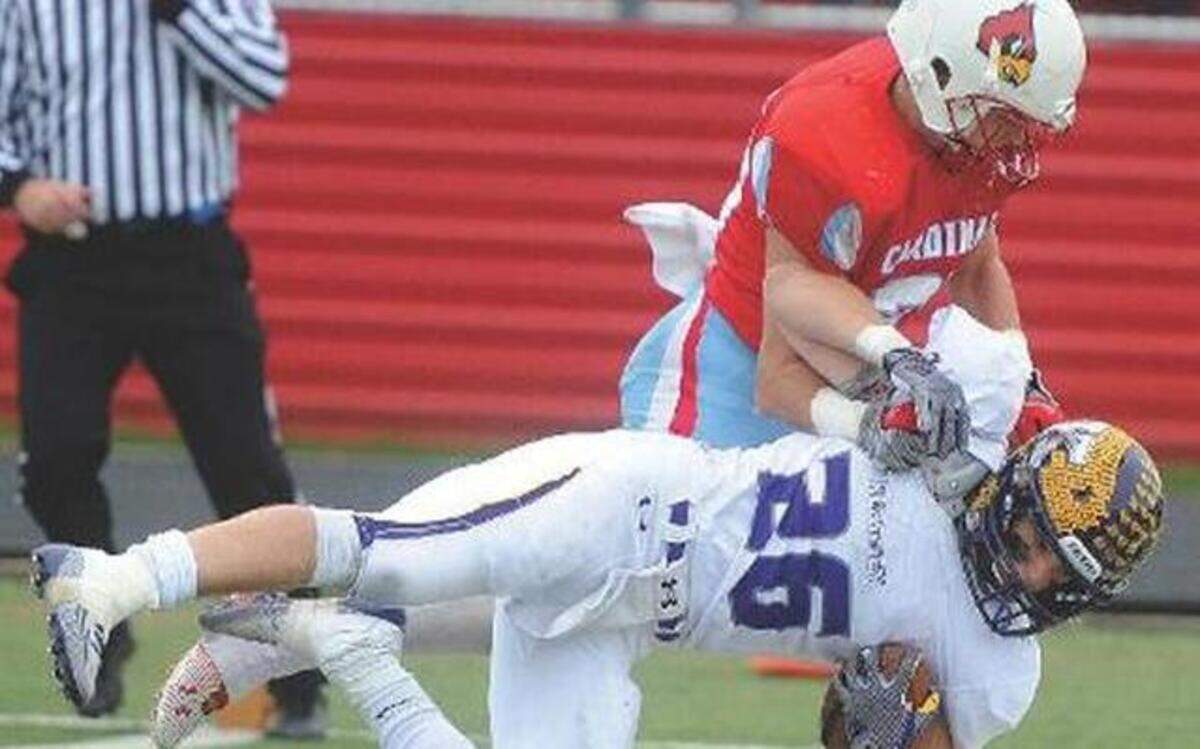 Running back Reagan Frakes scored Kearney’s only touchdown when he dived into the end zone as Webb City's Austin Carter defended during their Class 5 semifinal.