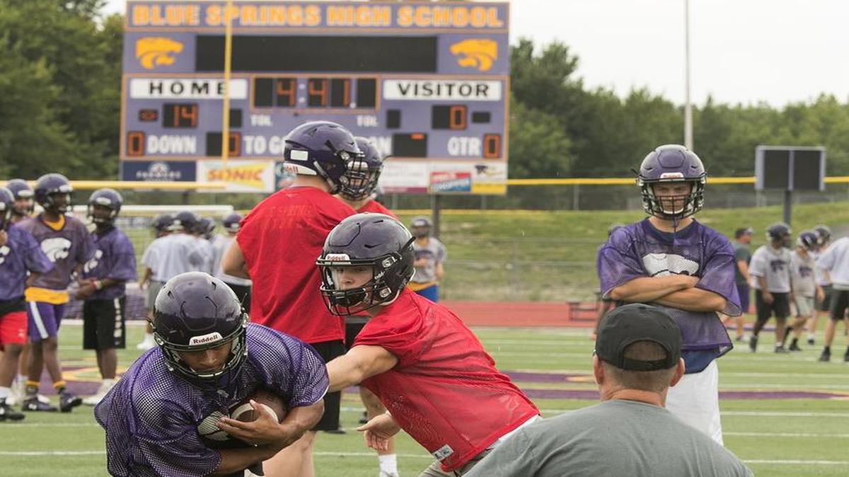 Blue Springs football coach Kelly Donohoe watched drills Monday, July 31, 2017 during the first day of high school football practice for Missouri high schools.